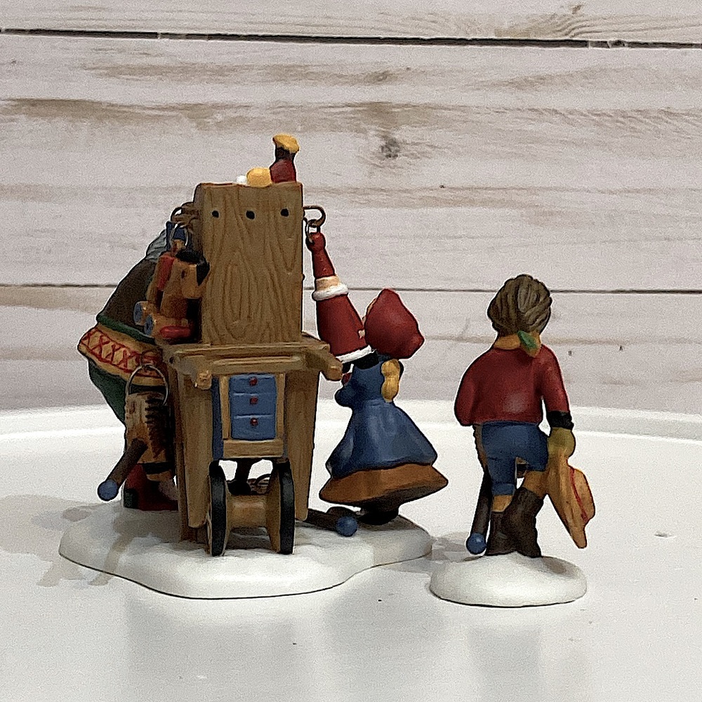 DEPARTMENT 56 - Christmas Bazaar Toy Vendor-Heritage Village-New England Village - Picture 4 of 9